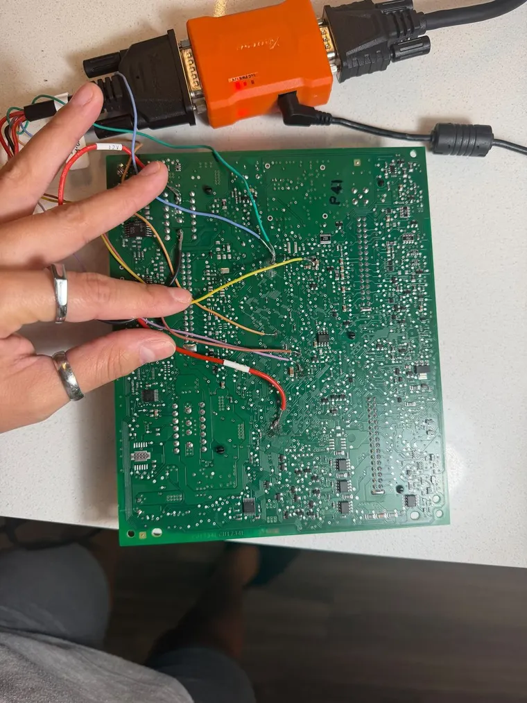 A control module board wired up to read immobiliser data